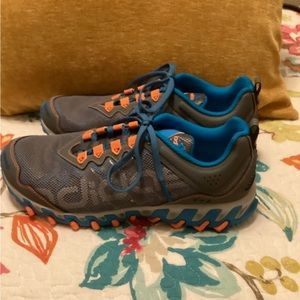 Brand new retired style Womens Adidas Vigor 4 size 10 in blue and orange.